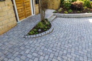 Garden design,  driveway, walling and steps by Stow Construction & Landscaping in Windygates Road, North Berwick 2015 using Marshalls Tegula Drivesett Pennant Grey, Tegula kerbs Pennant Grey, Drivesett kerbs Pennant Grey, Fairstone walling Silver Birch, Indian Sandstone Grey Multi.