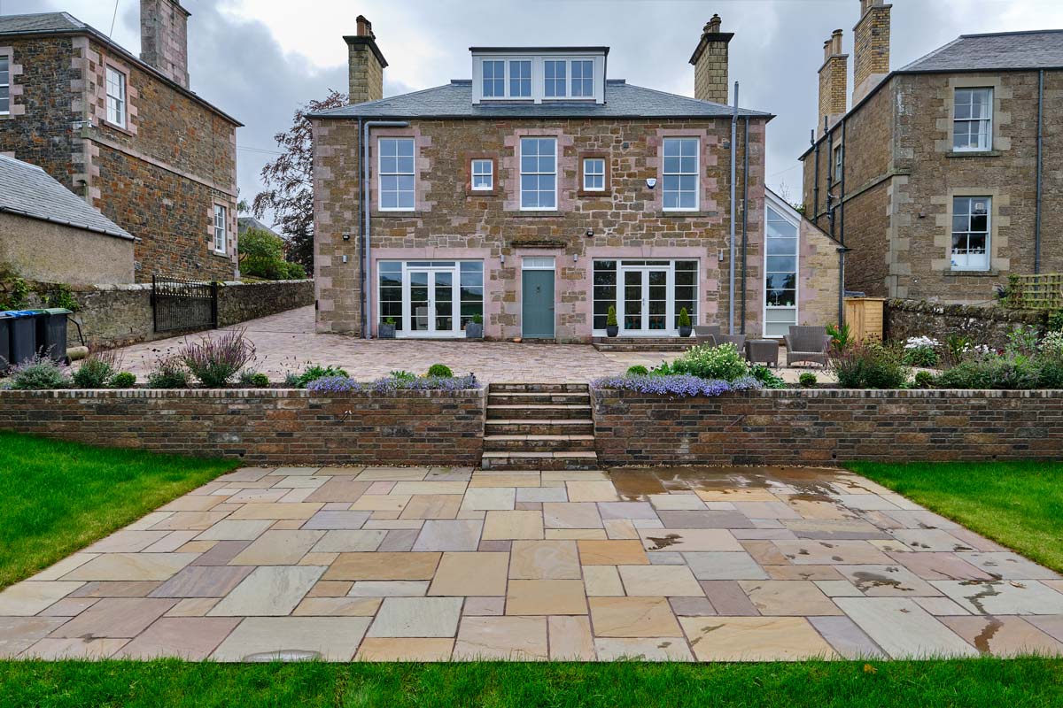 Driveway, patio, walling, steps and landscaping designed and installed by Stow Construction & Landscaping Marshalls Tegula Drivesett Traditional Harvest mix Fairstone Harena Riven Autumn Bronze Tegula walling Traditional steps landscaping paving monoblocking block paving Melrose Scottish Borders