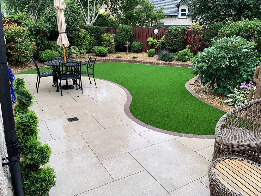 Patio, artificial grass, landscaping, kerbs and decorative edge detail by Stow Construction and Landscaping in Cardrona, Peebles, Scottish Borders 02